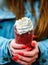 Woman hand holding a trdelnÃ Â Ã‚Â­k. Traditional tasty baked